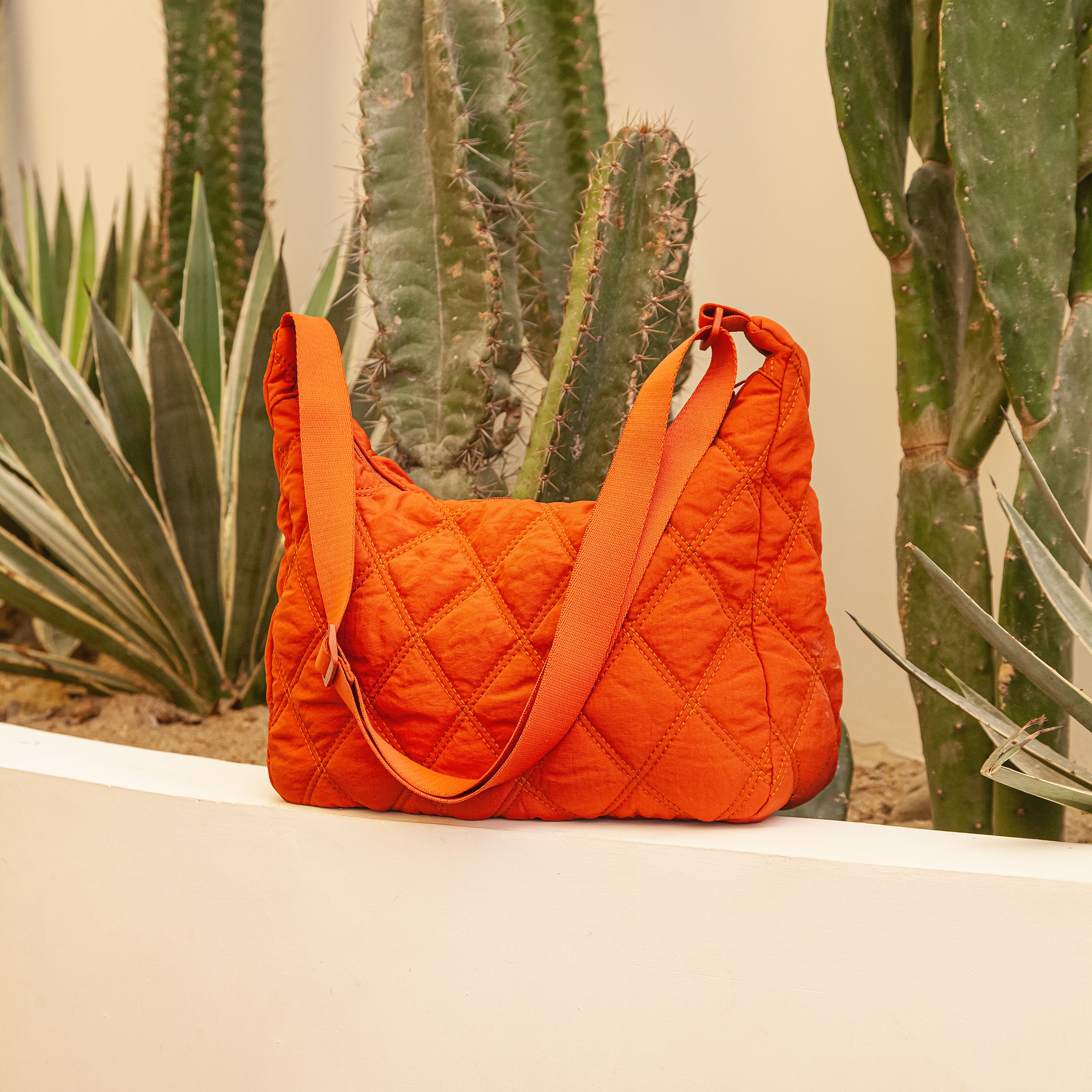 Melzano Quilted Puffer Bag