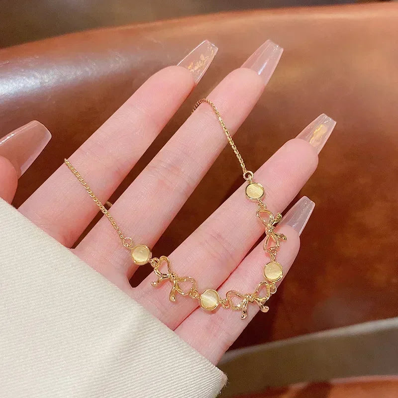 Serpenta Conjunt de 4 polseres de serp amb pedres precioses verdes i pedretes de strass