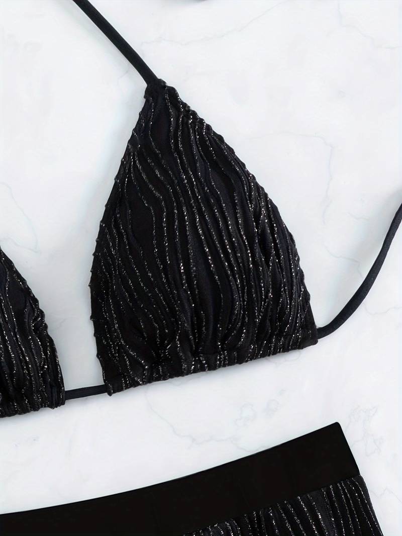 Melzano Alex Suit | Zwarte glitterbikini met halternektopje en hoog uitgesneden zwembroekje