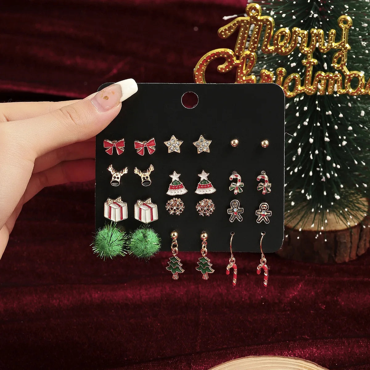 JollyGems – Set of 12 Christmas Earrings with Reindeer & Bell Design