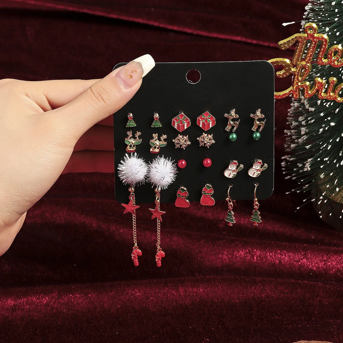 JollyGems – Set of 12 Christmas Earrings with Reindeer & Bell Design
