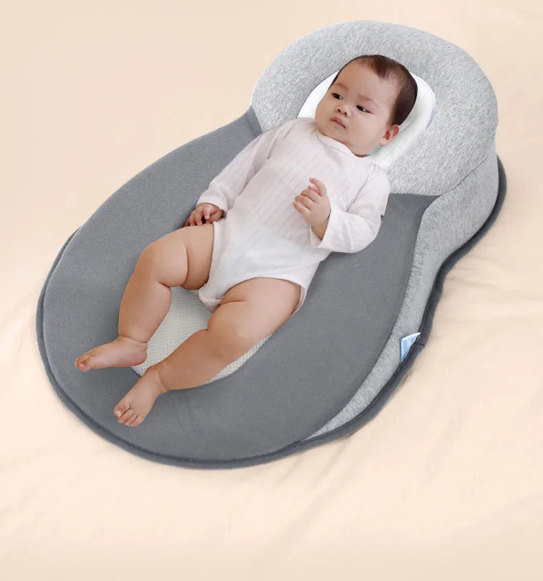Nestlenap – Ergonomisch babykussen tegen plat hoofdje – 0-6 maanden