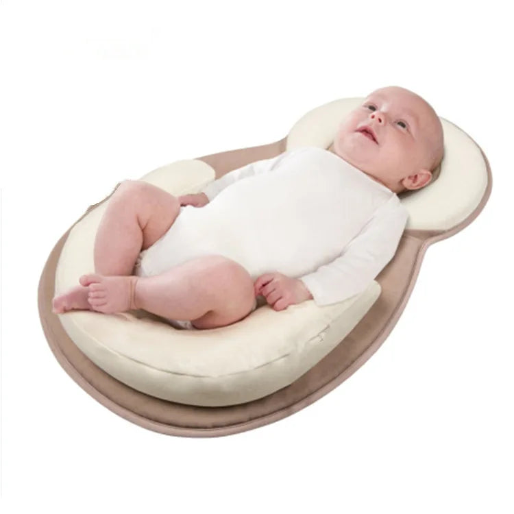 Nestlenap – Ergonomisch babykussen tegen plat hoofdje – 0-6 maanden